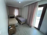 Gümüldür Fevzi Çakmak’ta Denize Sıfır, Havuzlu Prestijli Satılık 3+1 Villa