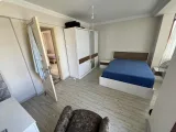Gümüldür Fevzi Çakmak’ta Denize Sıfır, Havuzlu Prestijli Satılık 3+1 Villa