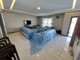 Seferihisar Cumhuriyet Mahallesi'nde denize 1 km satılık 4+1 geniş bahçeli lüks villa